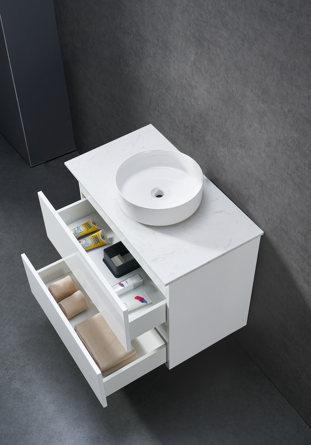 750mm Gloss white wall hung vanity with stone bench top and above counter basin